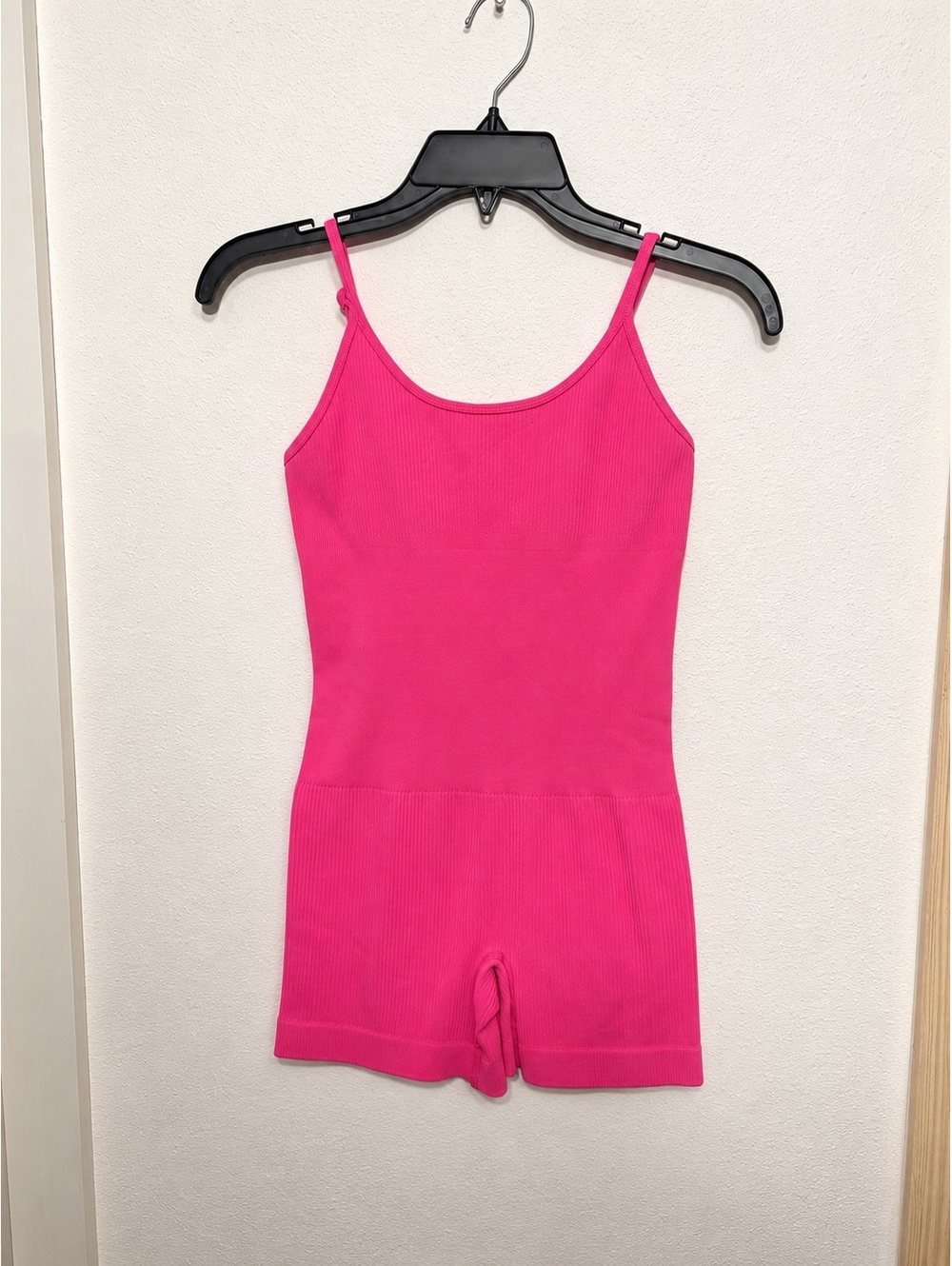Pink ribbed sleeveless romper
